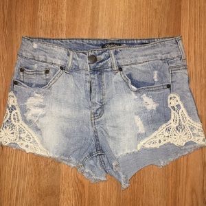 Medium Washed Ripped Jean Shorts